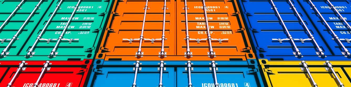 Stacked shipping containers in several colours